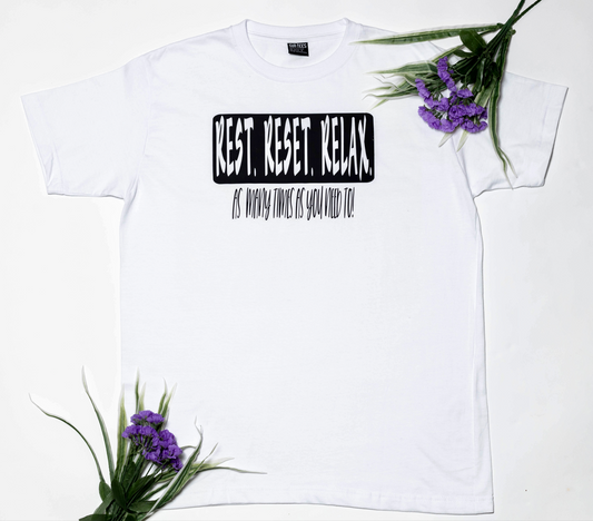 Short sleeve white t-shirt, with a very important reminder: Rest. Reset. Relax. As many times as you need to!