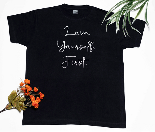 Short sleeve black t-shirt, with a very important message: Love. Yourself. First.